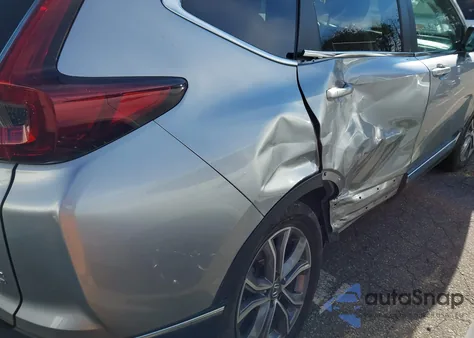 2021 Honda Cr-V Hybrid Touring z USA, uszkodzony, nr VIN 7FART6H93ME038094